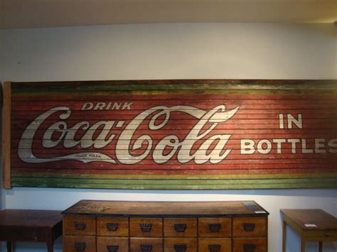 wooden coke signs